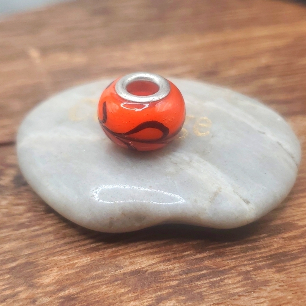 Retro vibrant orange swirl sterling charm‎